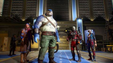 Captain Boomerang, King Shark, Deadshot and Harley Quinn stand outside the Hall of Justice museum in a screenshot from Suicide Squad: Kill the Justice League