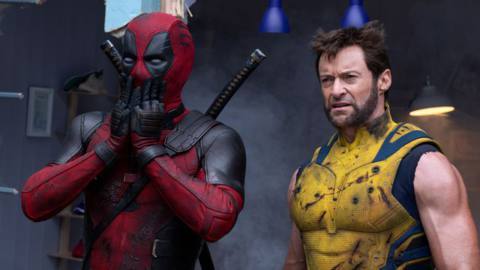 A battle-scarred Deadpool puts his hands over his mouth in shock as a beat-up Wolverine looks weary beside him in a scene from the film Deadpool &amp; Wolverine