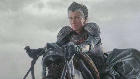 Rhaenys (Eve Best) riding on the back of a dragon