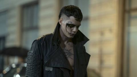 Bill Skarsgård in gothy black-and-white face paint and a trenchcoat, as the resurrected undead vengeance-seeker Eric in 2024’s reboot of The Crow