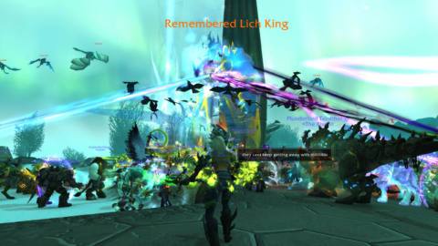 A radiant echoes event wherein the Lich King is being swarmed by players.