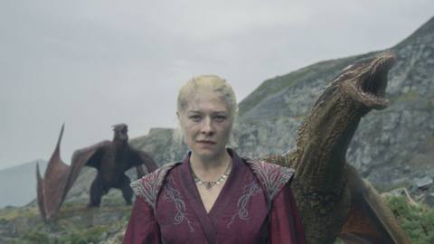 Rhaenyra (Emma D’Arcy) standing on Dragonstone with dragons behind her in a still from House of the Dragon season 2 episode 7