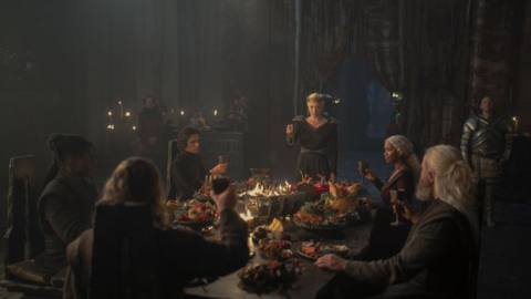 Rhaenyra (Emma D’Arcy) toasting a table of dragonriders