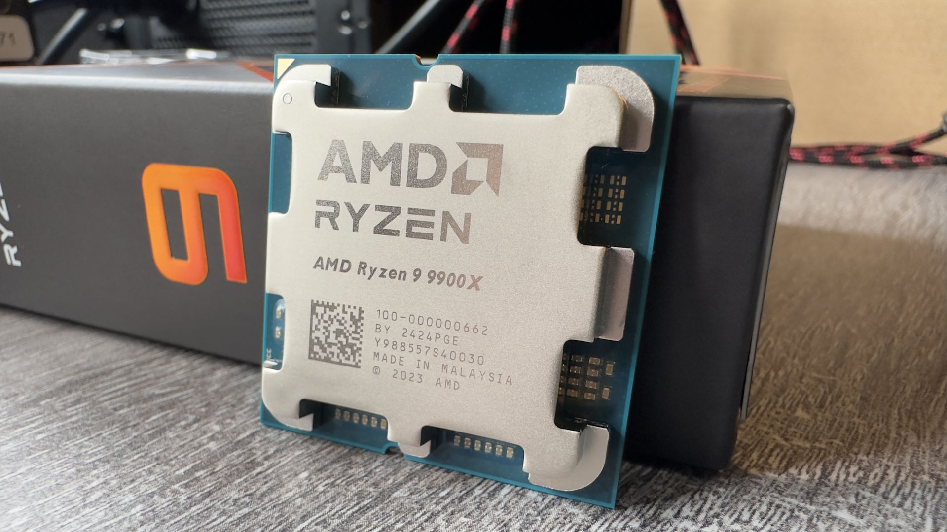 A photo of an AMD Ryzen 9 9900X processor