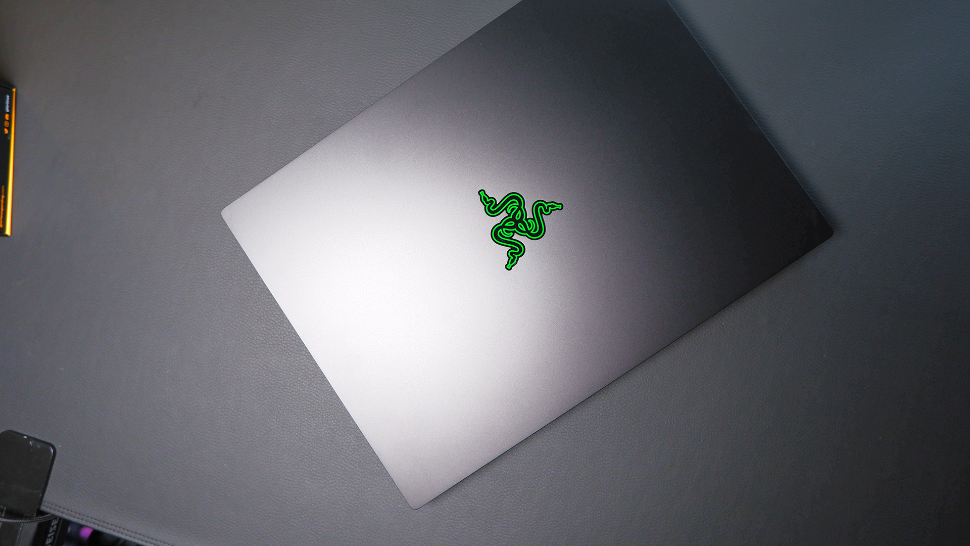 Razer Blade 14 gaming laptop on a desk.