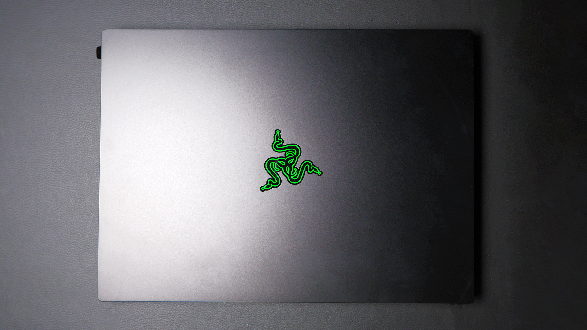 Razer Blade 14 gaming laptop on a desk.