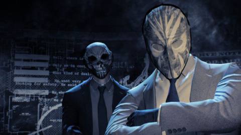 A shot of two masked dudes looking at the camera in Payday 2