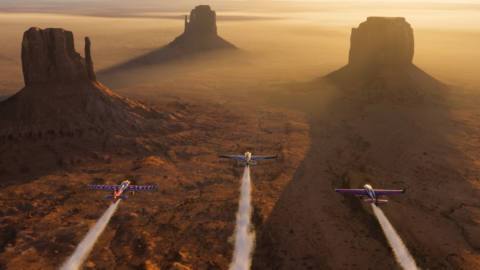 Three planes flying in formation over the desert in MSFS 2024