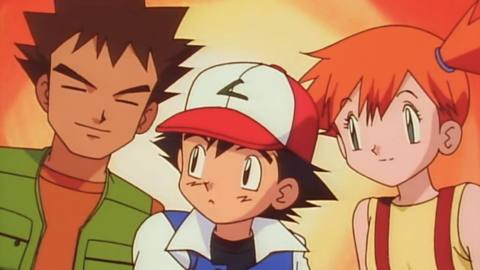 An image of Ash, Brock, and Misty in the original Pokémon anime series.