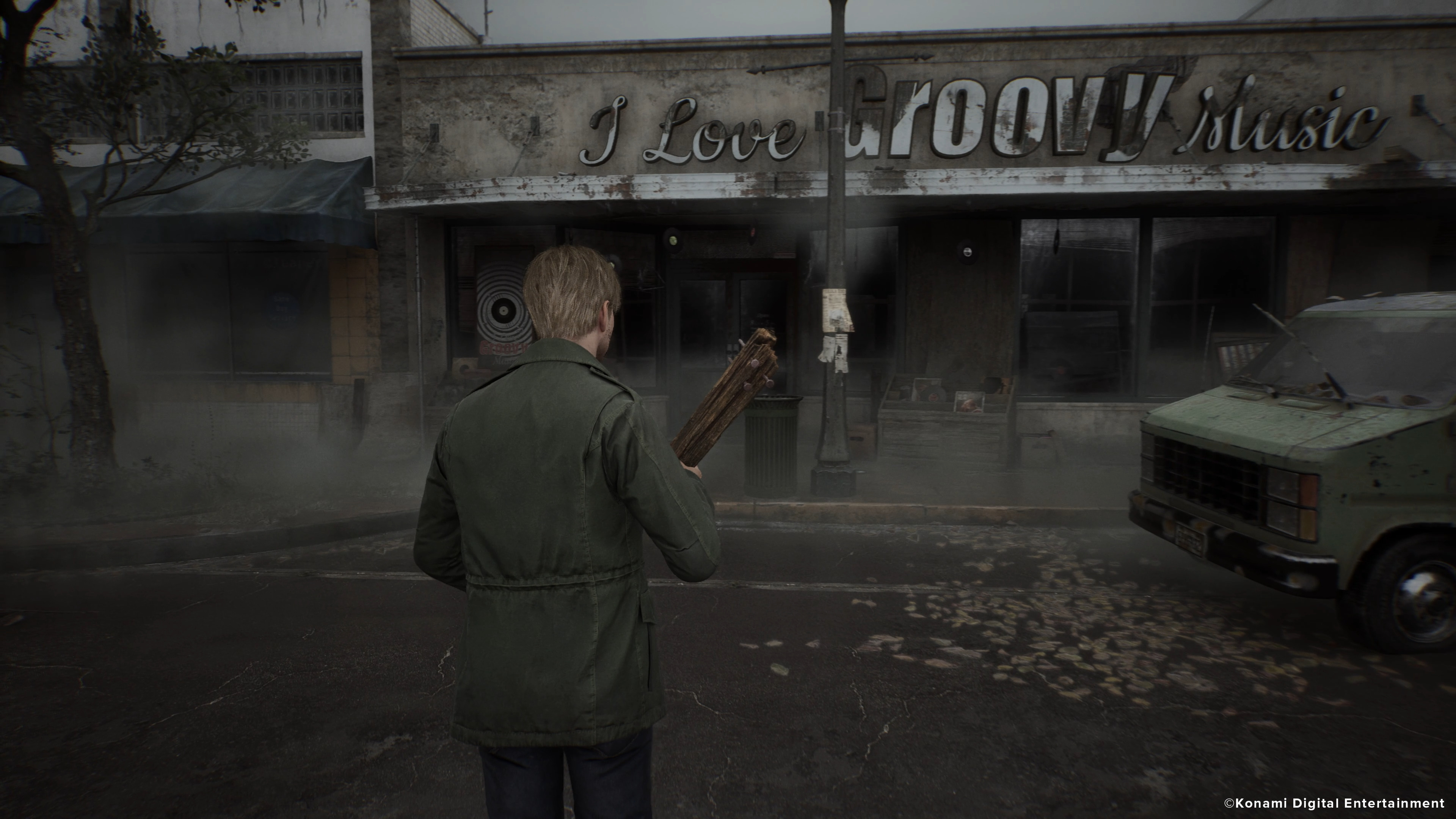 James Sunderland, wielding a wooden club, approaches a store called 'I Love Groovy Music'.