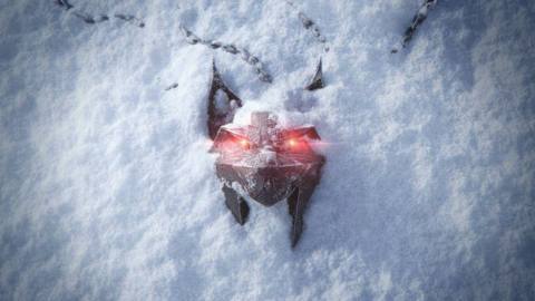 A lynx-shaped Witcher medallion with glowing red eyes lying on snow