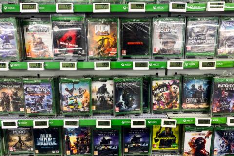 A photo of a bunch of video games on a store shelf