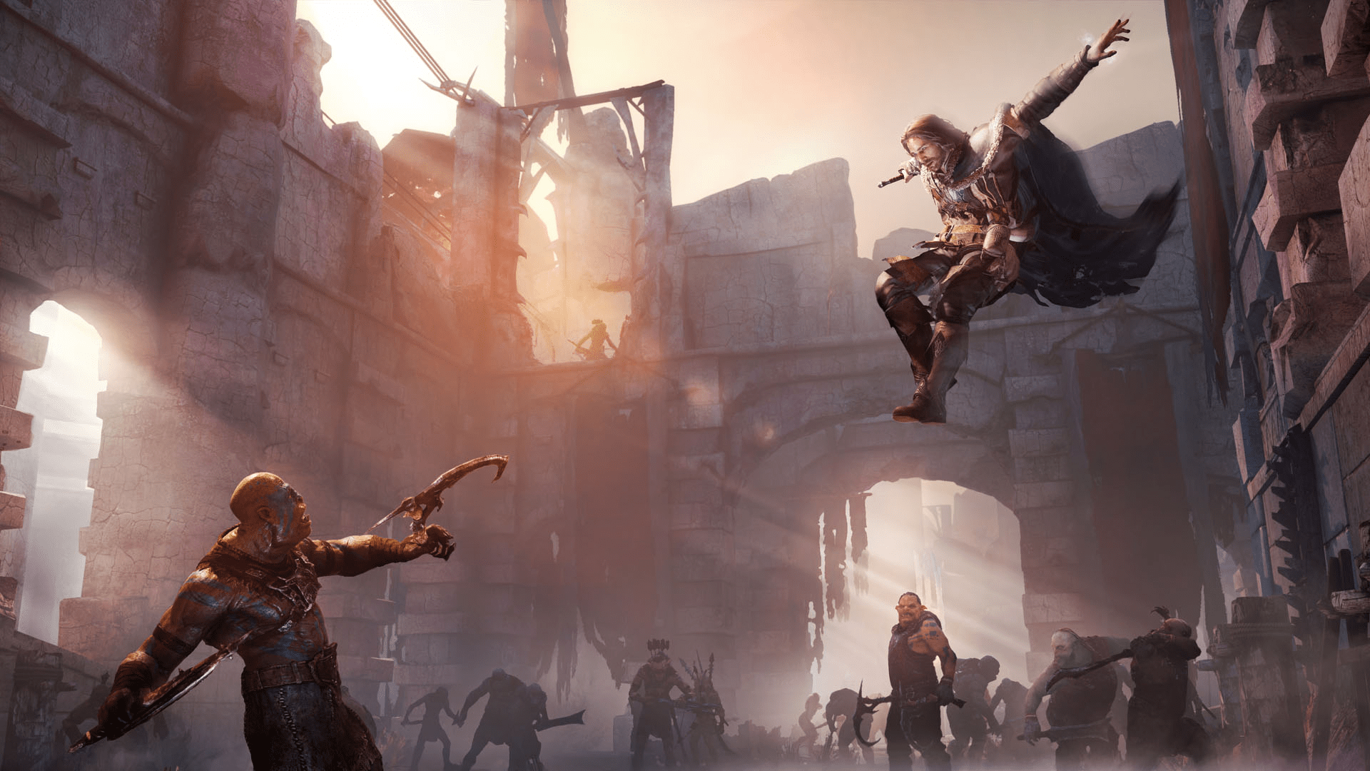 A screenshot from Middle-Earth: Shadow of Mordor showing Talion attacking an Orc