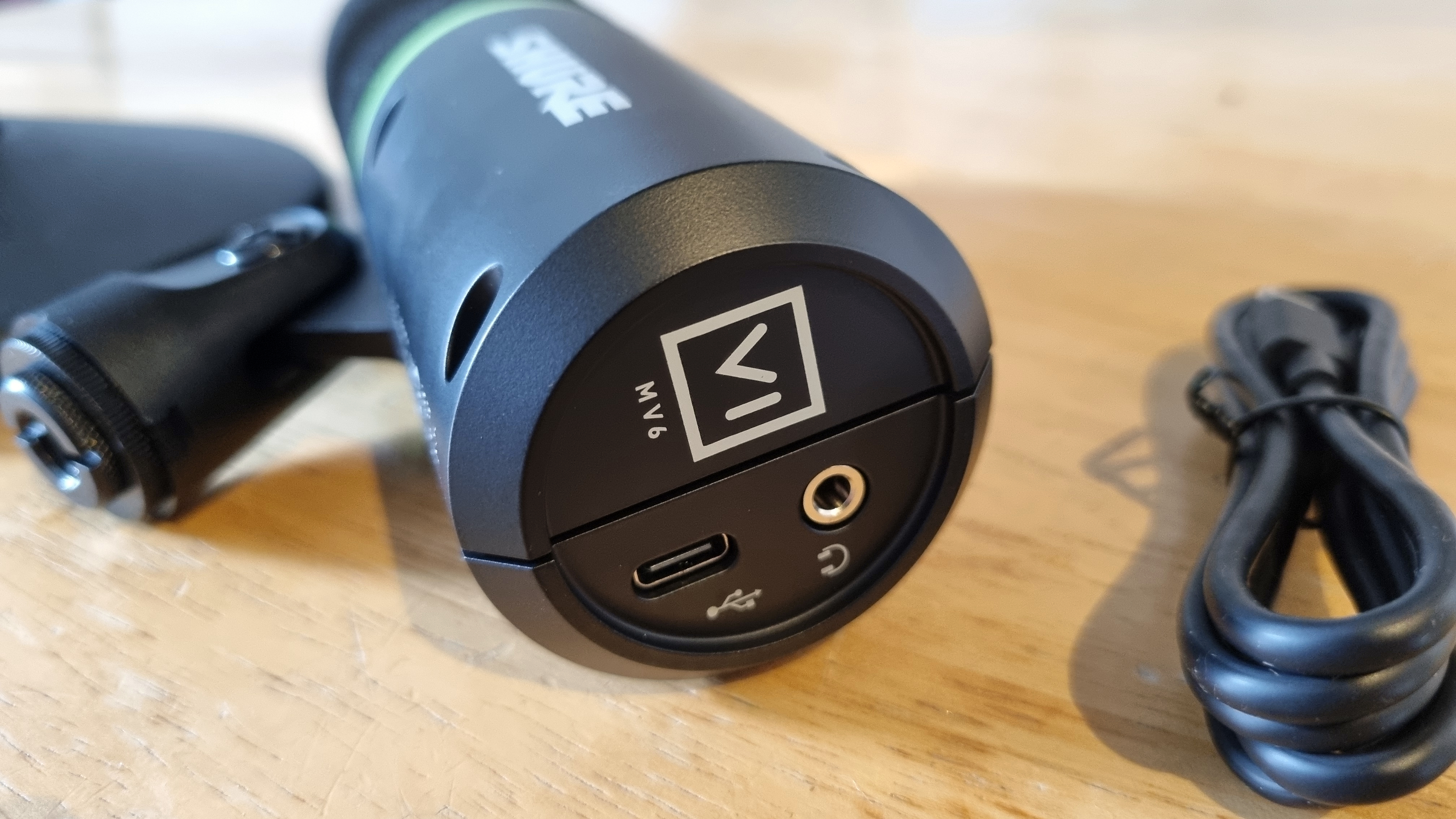 The rear of the Shure MV6 USB Gaming Microphone, showing the USB Type-C connection and the 3.5 mm audio jack