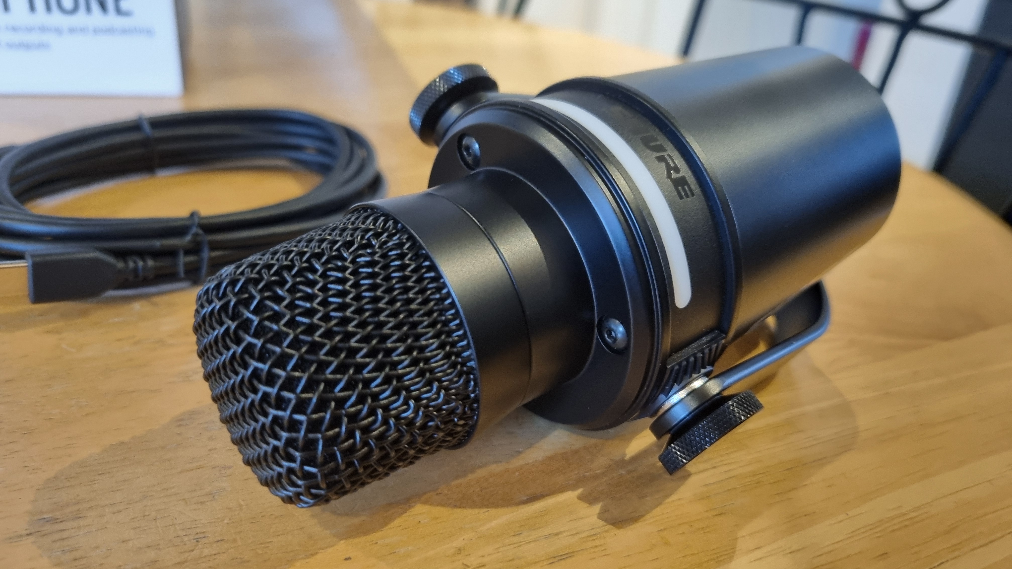 A close up of the Shure MV7+ Podcast Microphone with the foam filter removed