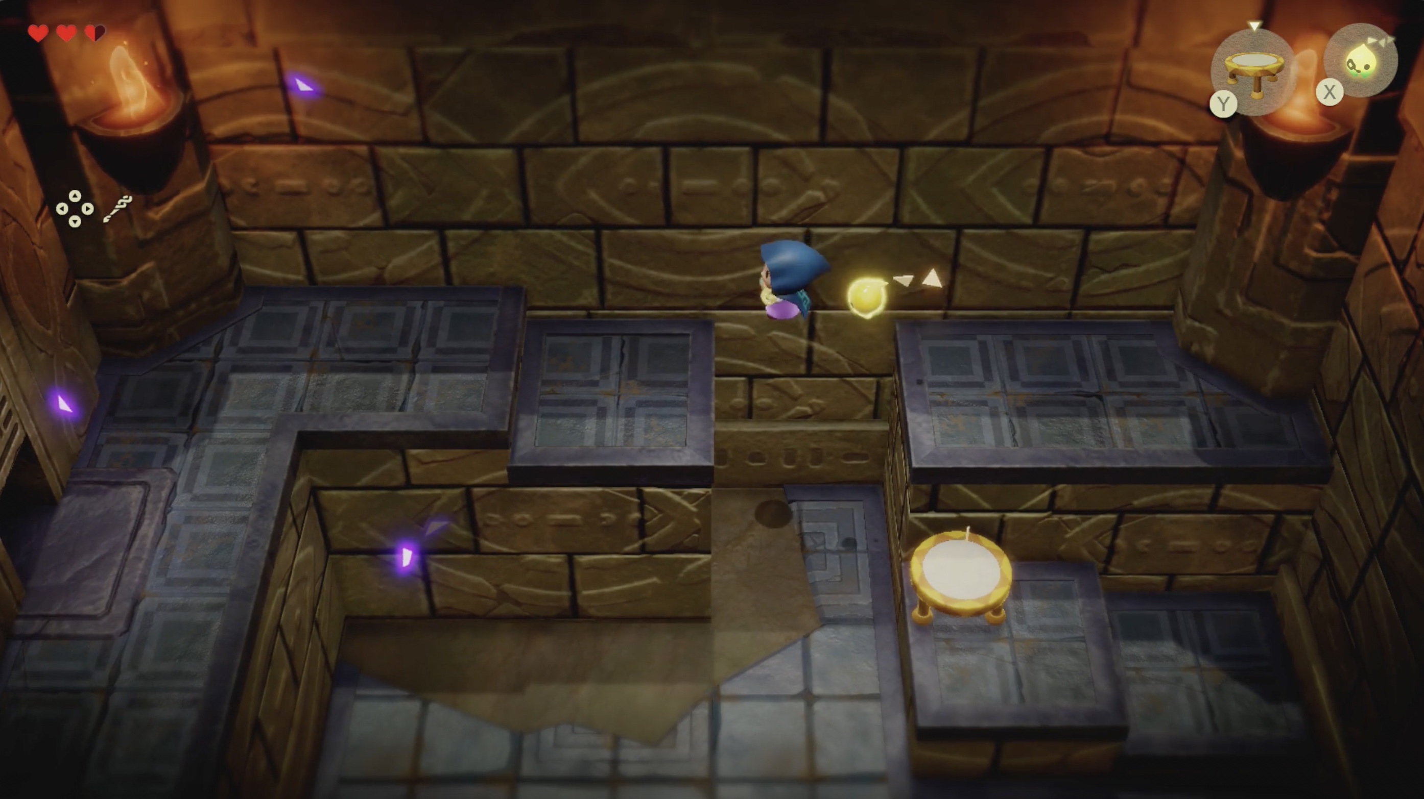 Zelda jumps across a gap in Suthorn Ruins in Echoes of Wisdom