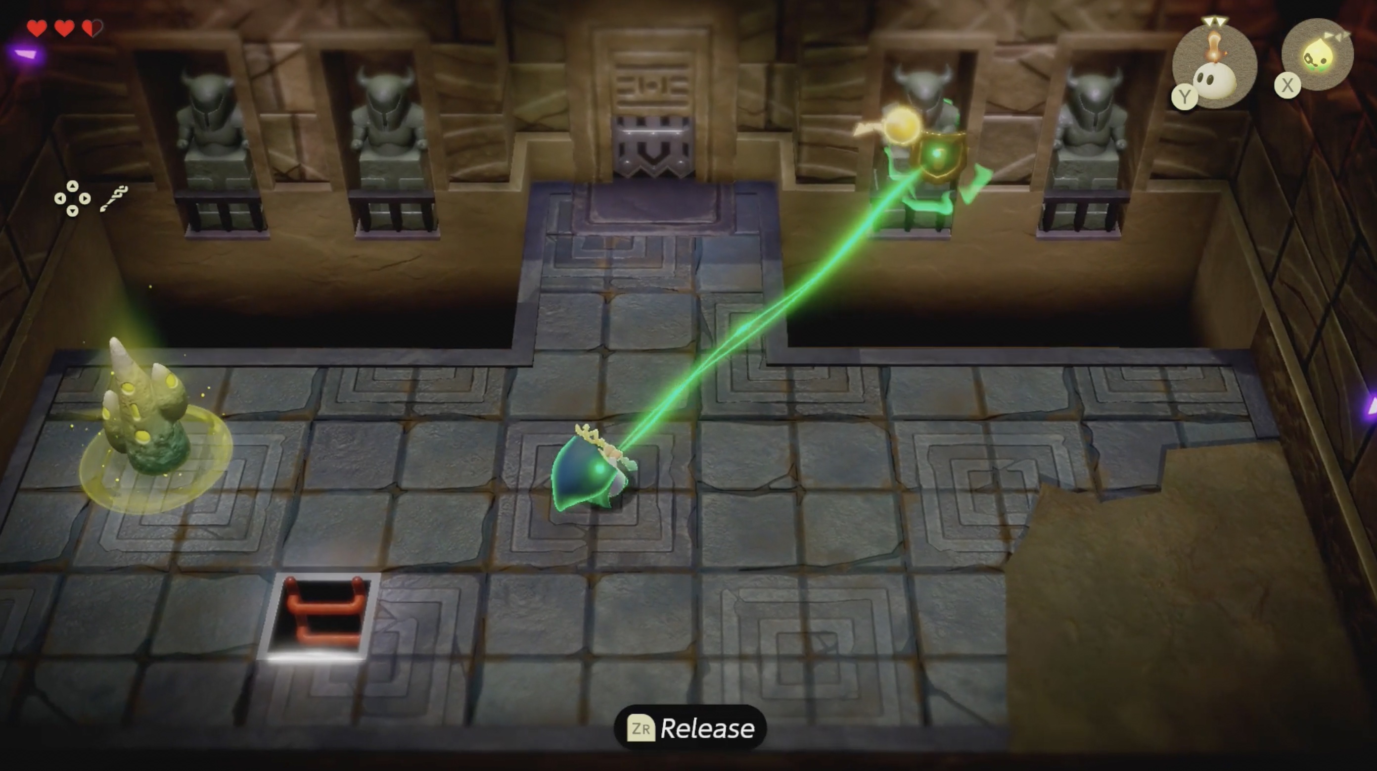 Zelda uses Bind to remove a shield from a darknut statue in Suthorn Ruins in Echoes of Wisdom