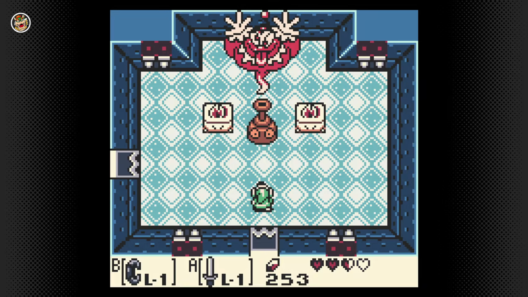Link encounters Genie, the boss of the second dungeon in The Legend of Zelda: Link’s Awakening DX Link encounters Genie, the boss of the second dungeon in The Legend of Zelda: Link’s Awakening DX