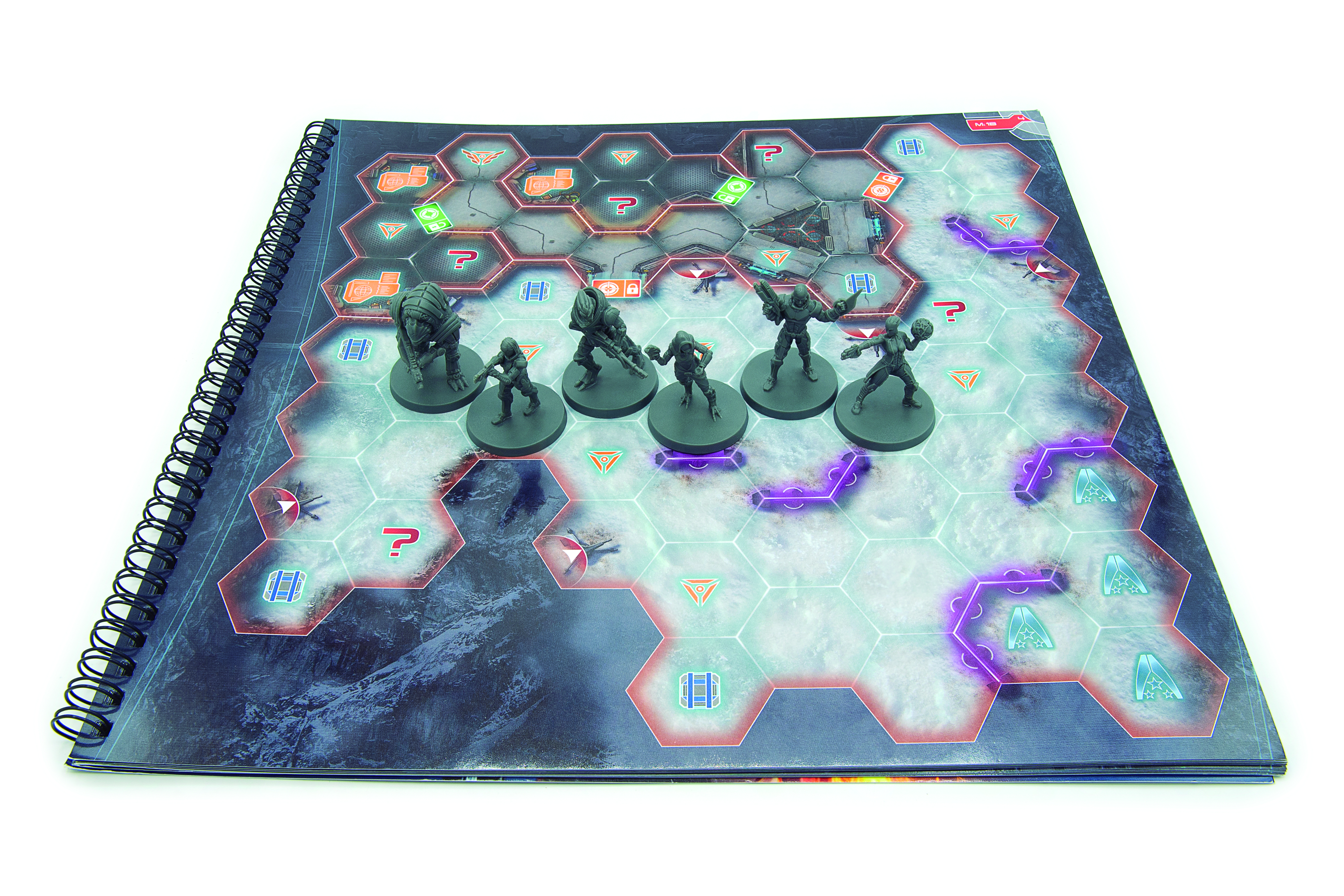 The five miniatures on one of the mission maps in the board game Mass Effect: Priority Hagalaz.