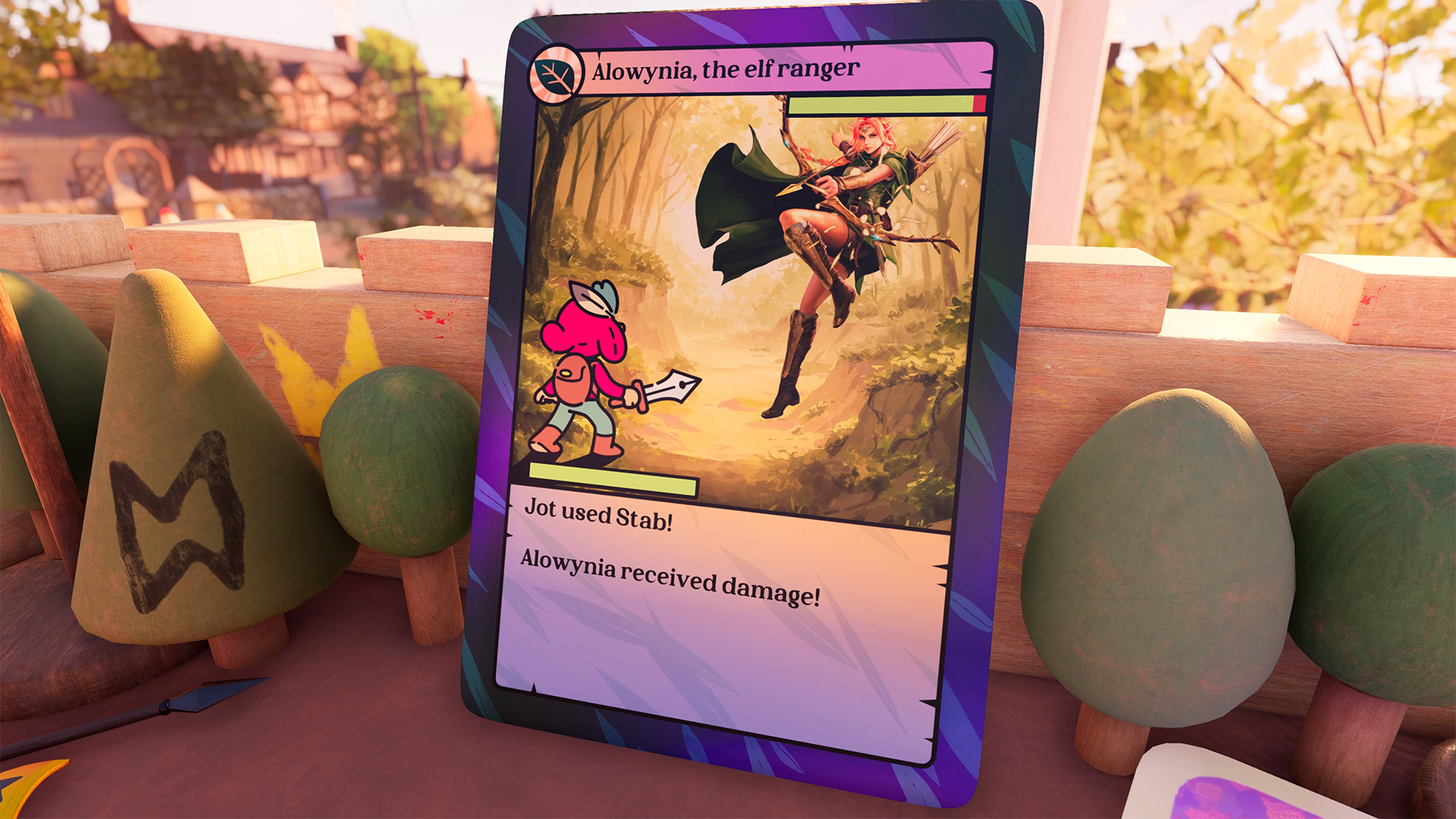 Jot appears on a Magic-style trading card engaged in a Pokemon-style battle with “Alowynia, the elf ranger.” Around the card are wooden blocks and toy trees in 3D