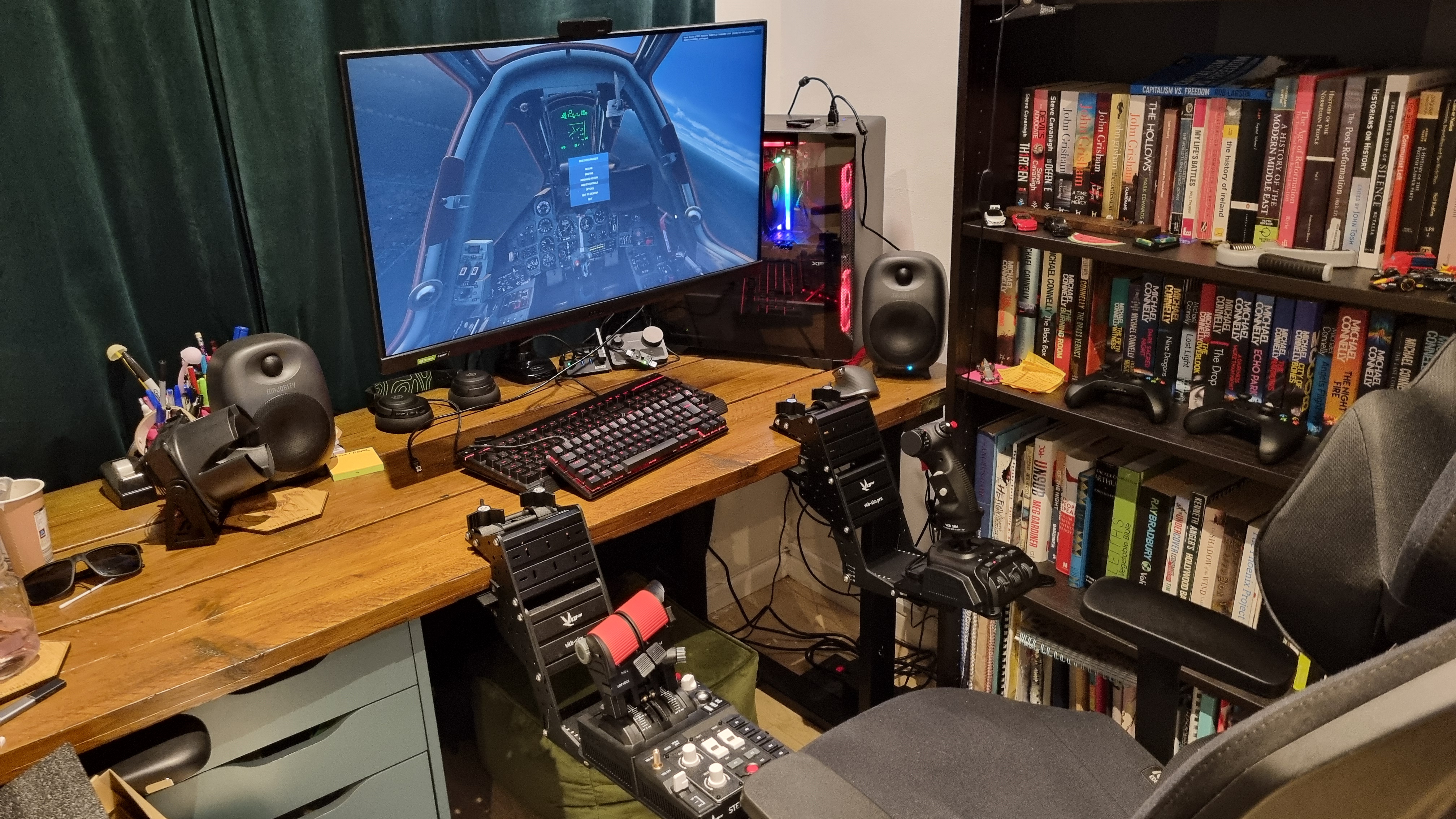 The VKB Gladiator NXT EVO F-14 Combat Edition + STECS Throttle System mounted to a desk