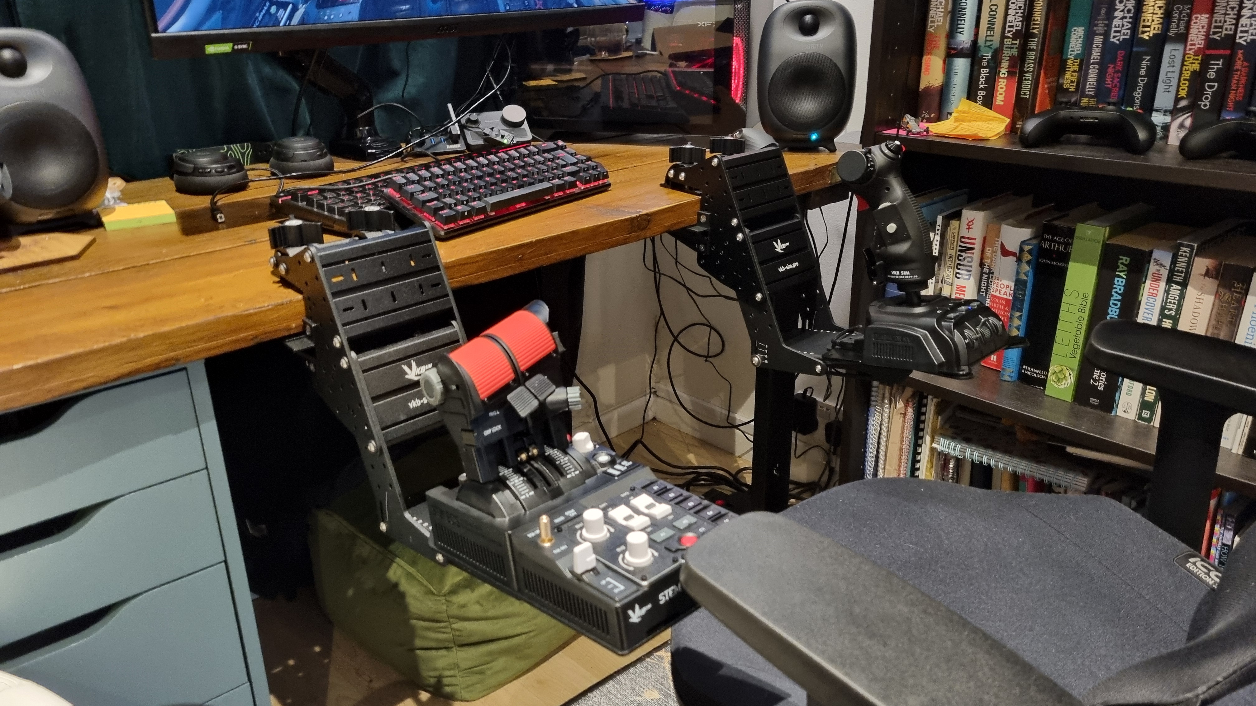 The VKB Gladiator NXT EVO F-14 Combat Edition + STECS Throttle System mounted to a desk