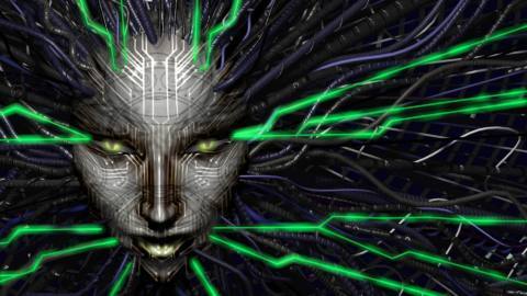 A stylized image from System Shock 2 shows a woman’s face made of gray metal covered with circuit-board effects, surrounded by green lightning