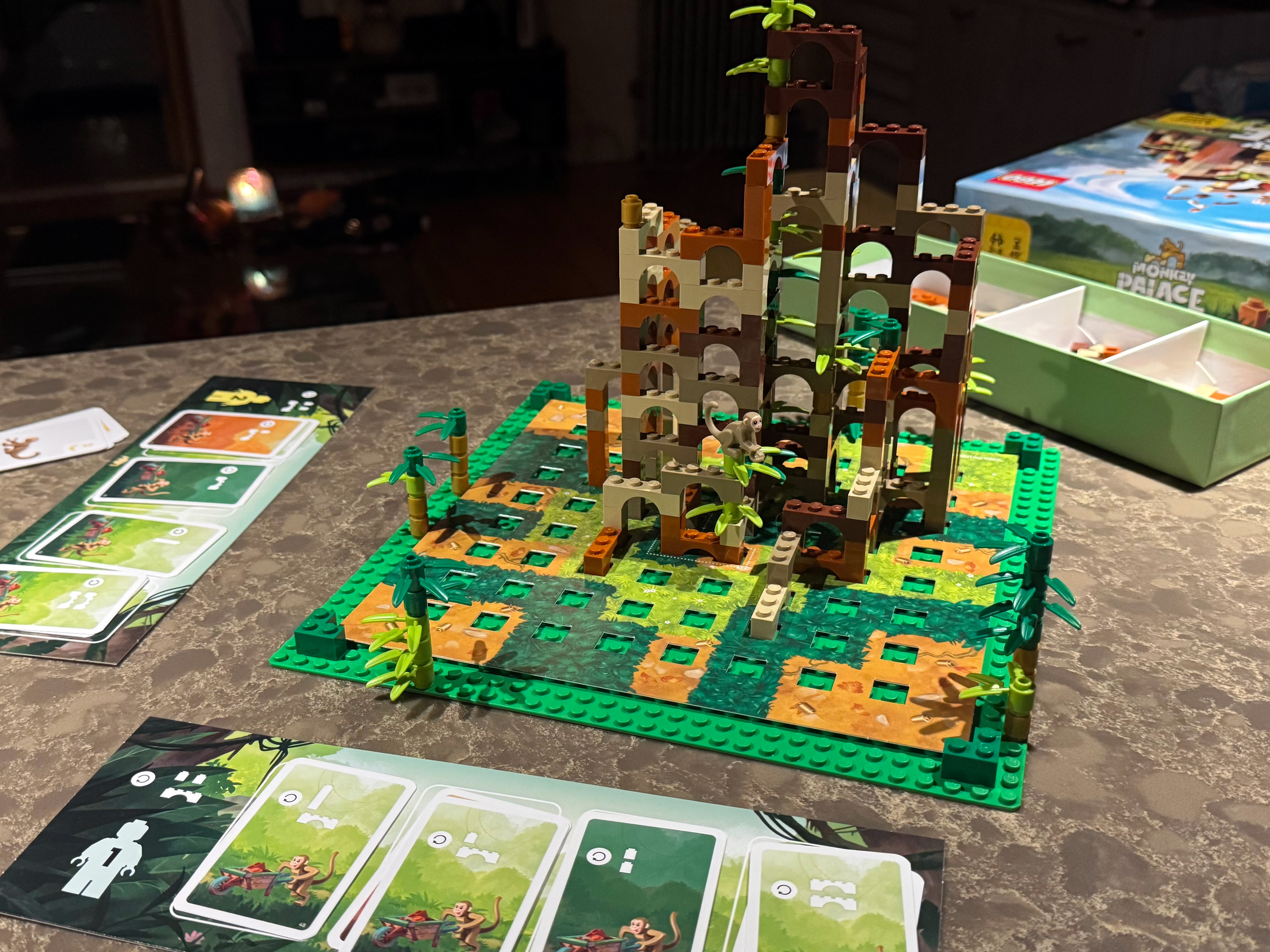 Monkey Palace set up for play, with two player sideboards visible. Each is loaded up with cards that activate special abilities each round. Monkey Palace set up for play, with two player sideboards visible. Each is loaded up with cards that activate special abilities each round.