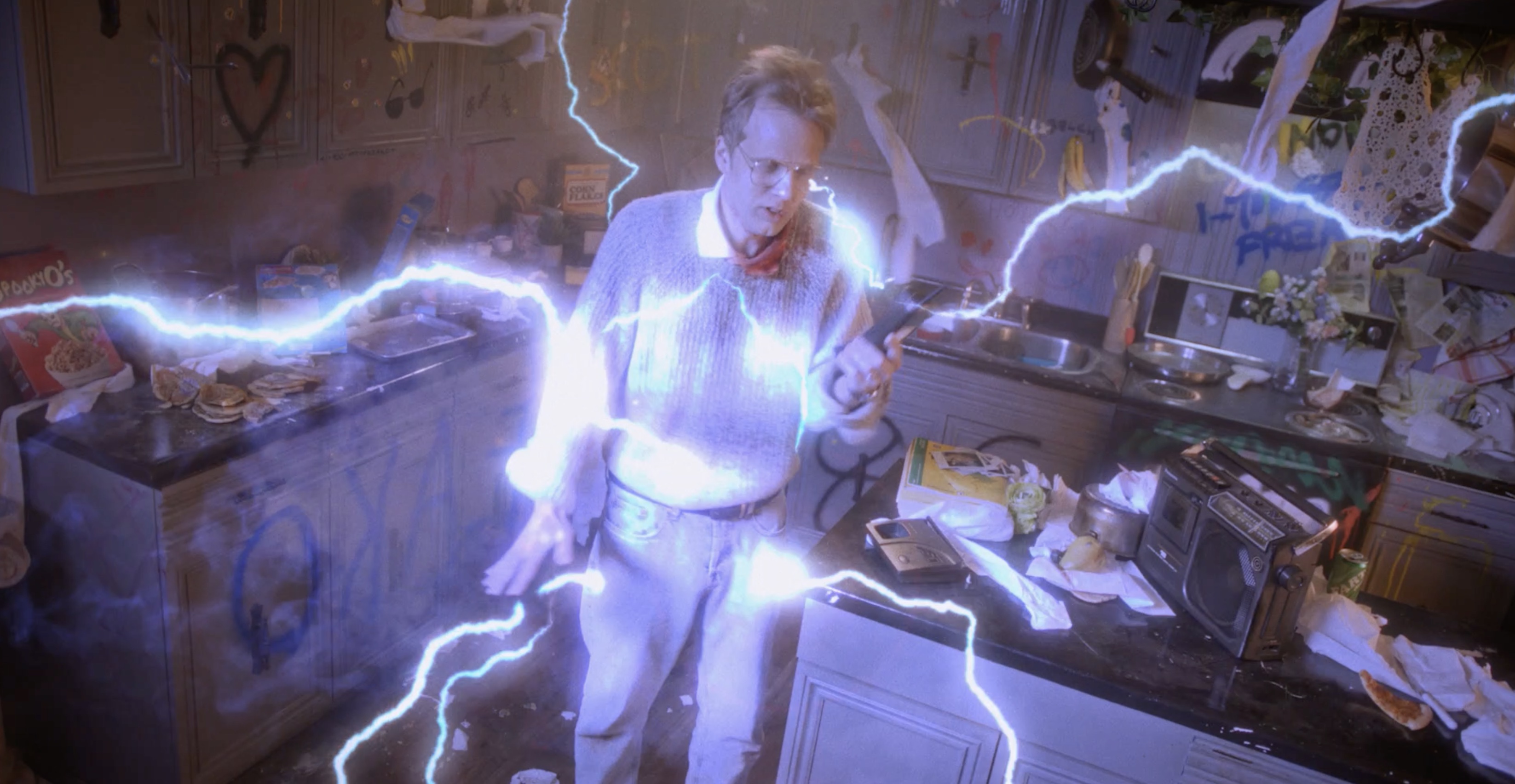 Conor (Conor Sweeney) gets electrified in his destroyed kitchen in Frankie Freako