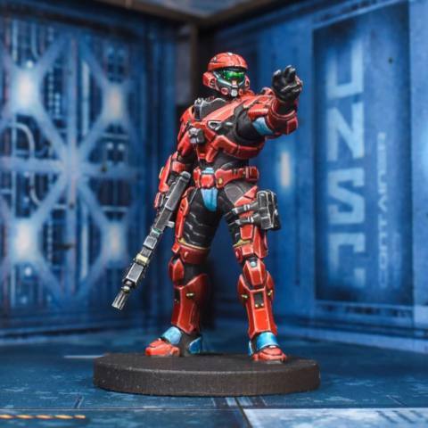 A red Spartan stands pointing two fingers into the distance.