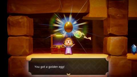 Zelda holds a golden egg from a chest in Echoes of Wisdom