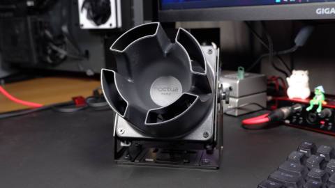 Noctua's NV-FS1 desk fan on a black desk.