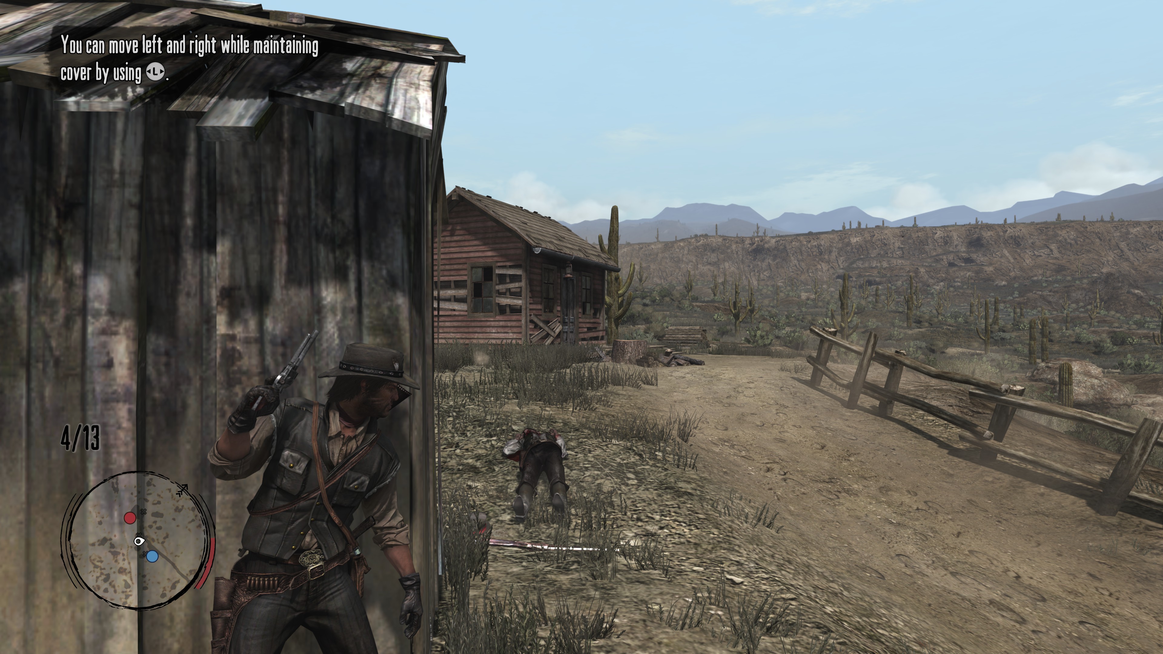 John Marston takes cover against an outhouse.