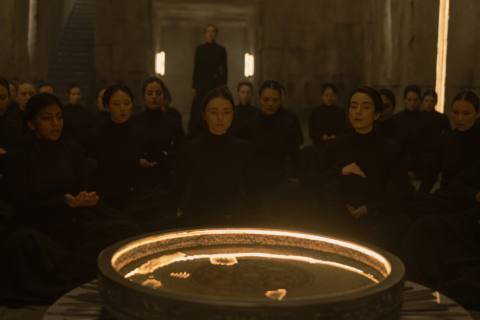 Sister Valya (Jessica Barden) sitting among other Bene Gesserit sisters in a still from Dune Prophecy