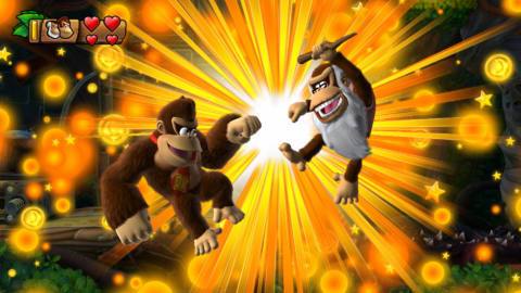 Diddy and Donkey Kong jump in the air to perform a fist bump in a screenshot from Donkey Kong Country: Tropical Freeze