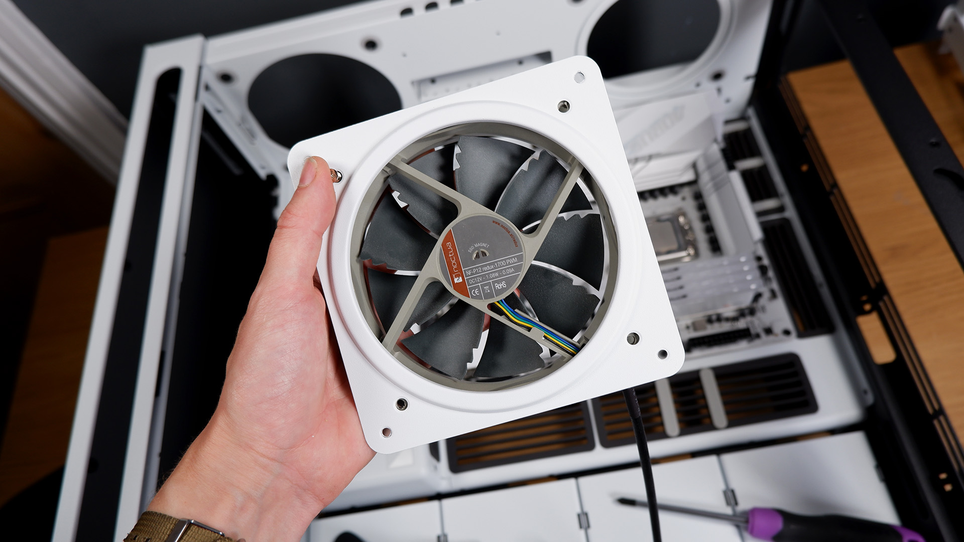 A Noctua fan inside a fan mount.