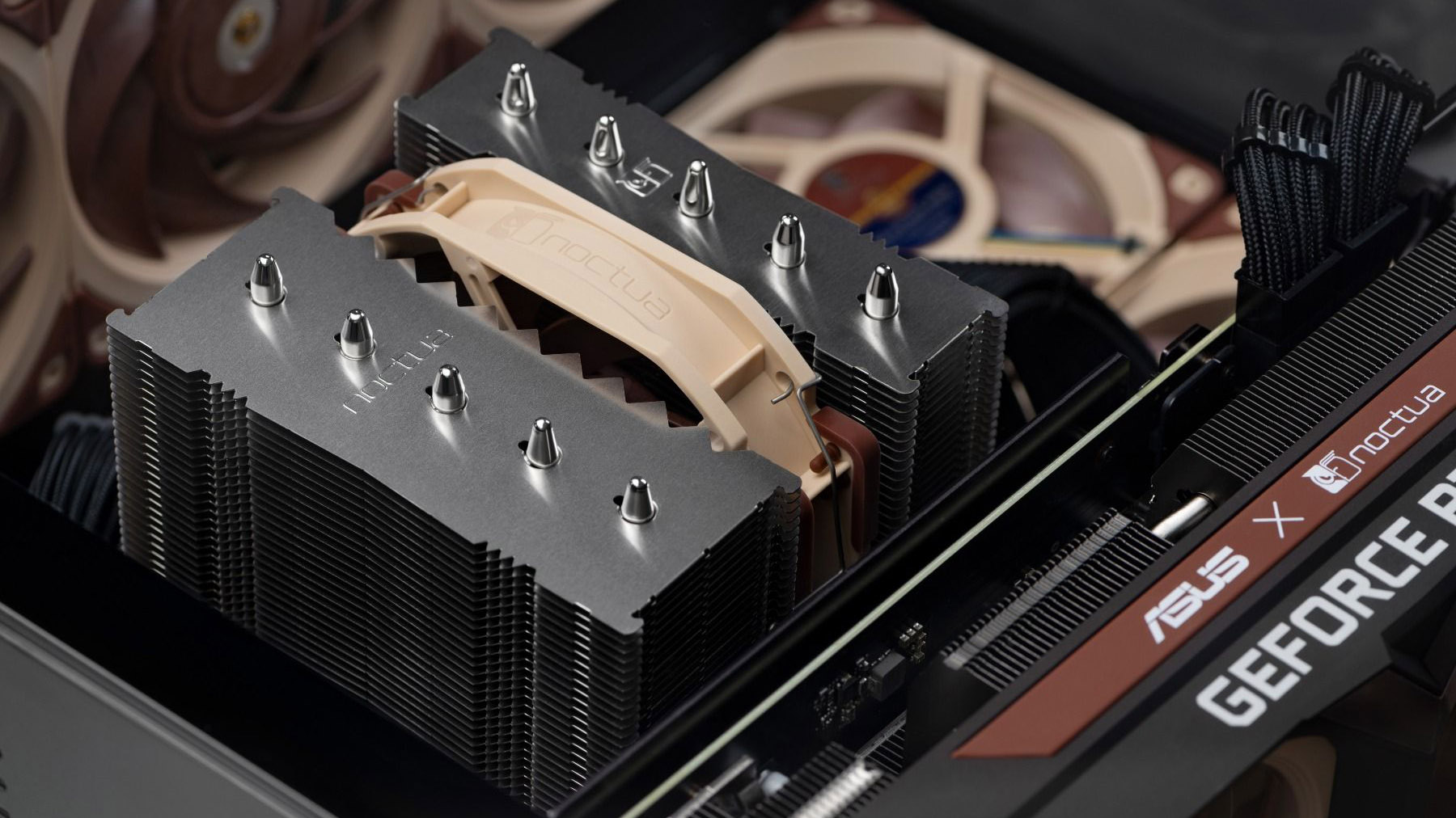 Noctual NH-D12L CPU cooler installed in a case with other Noctua products