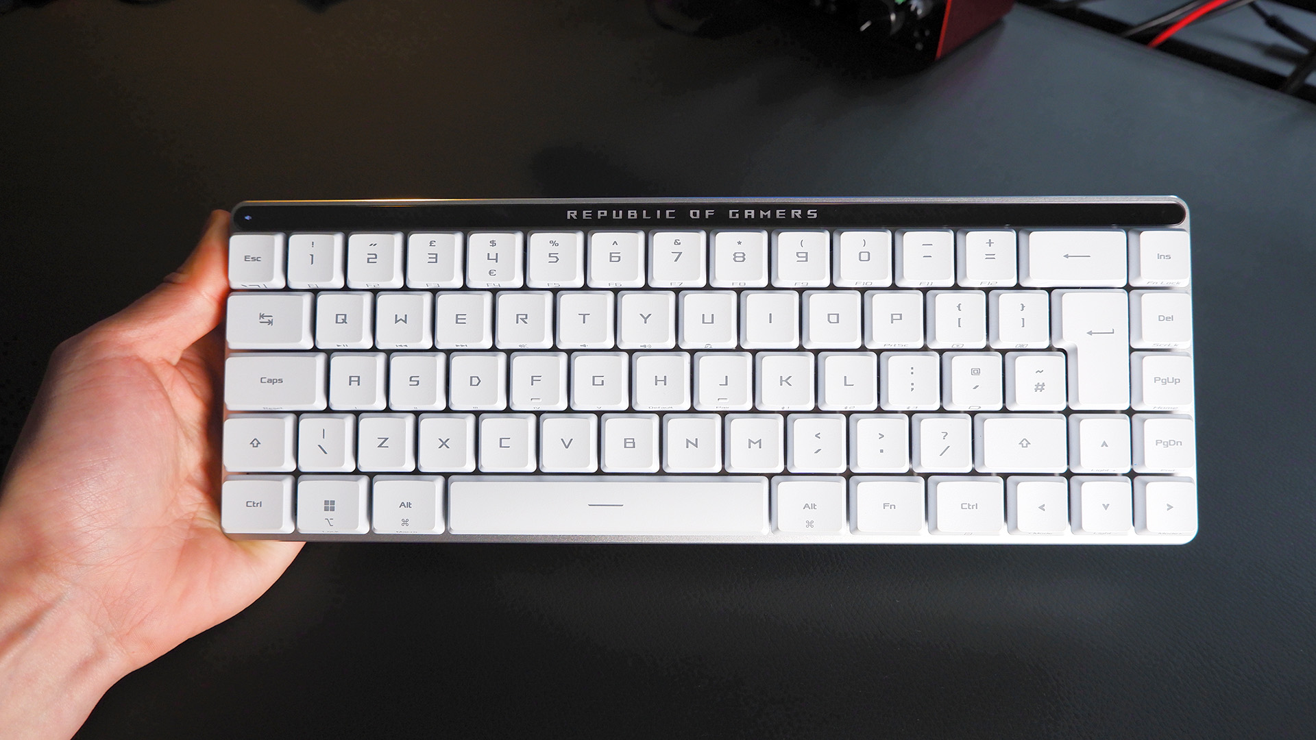 The ROG Falchion RX gaming keyboard in white set up on a desk.