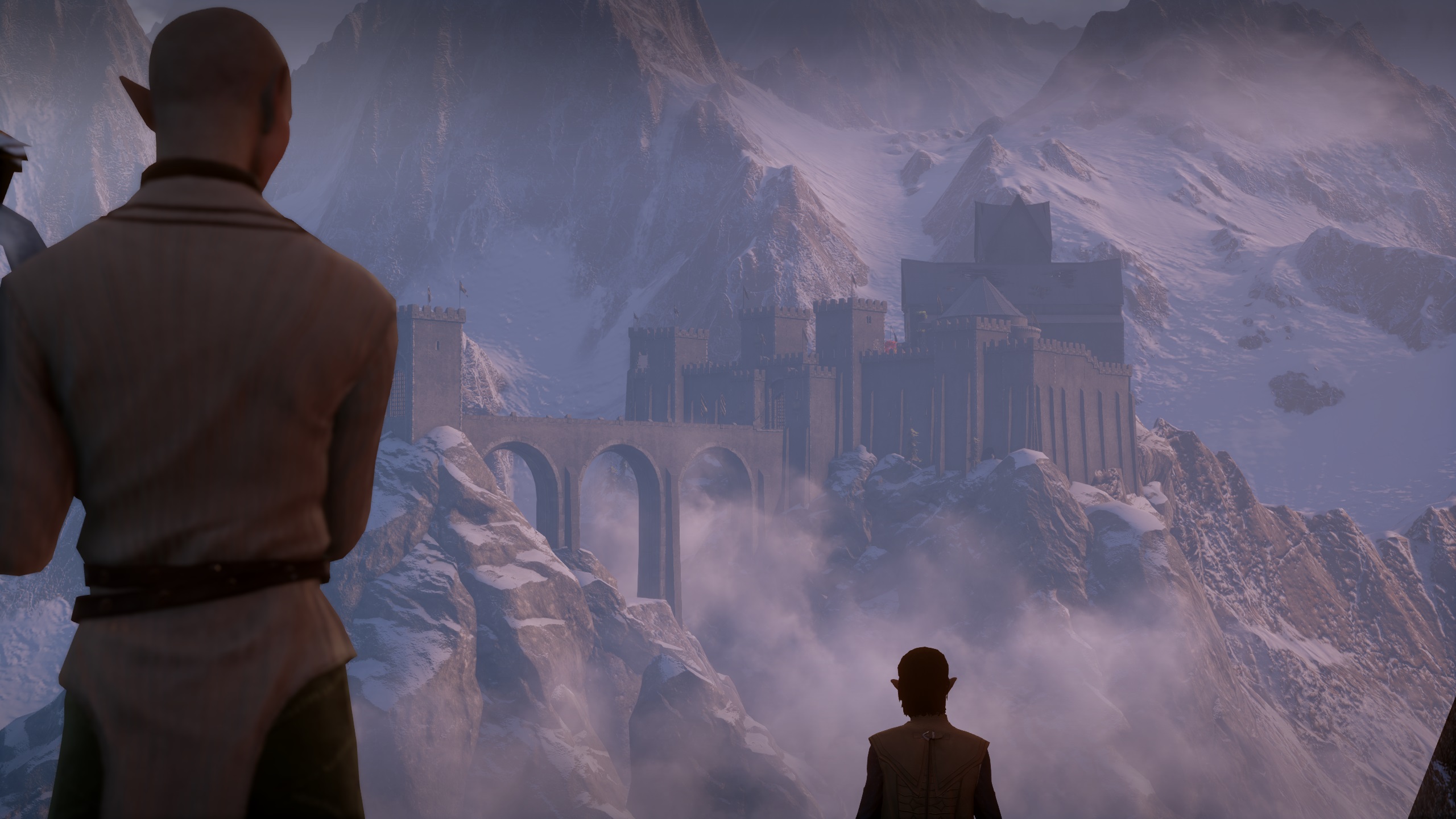 Dragon Age Inquisition - with their backs turned, Solas and the Inquisitor look over a snowy mountain valley to the Skyhold fortress