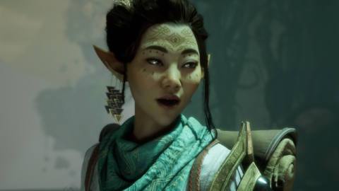 Bellara, a Dalish elf, looks off screen