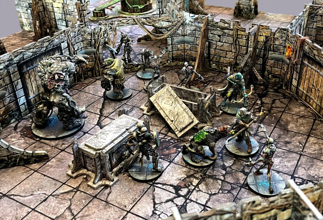 a setup of adventurers in a dungeon around an open tomb