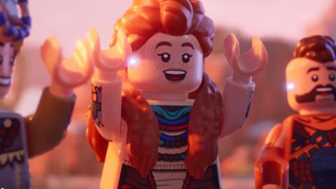 Lego Aloy raises her hands in the air like she just doesn’t care in key art for Lego Horizon Adventures