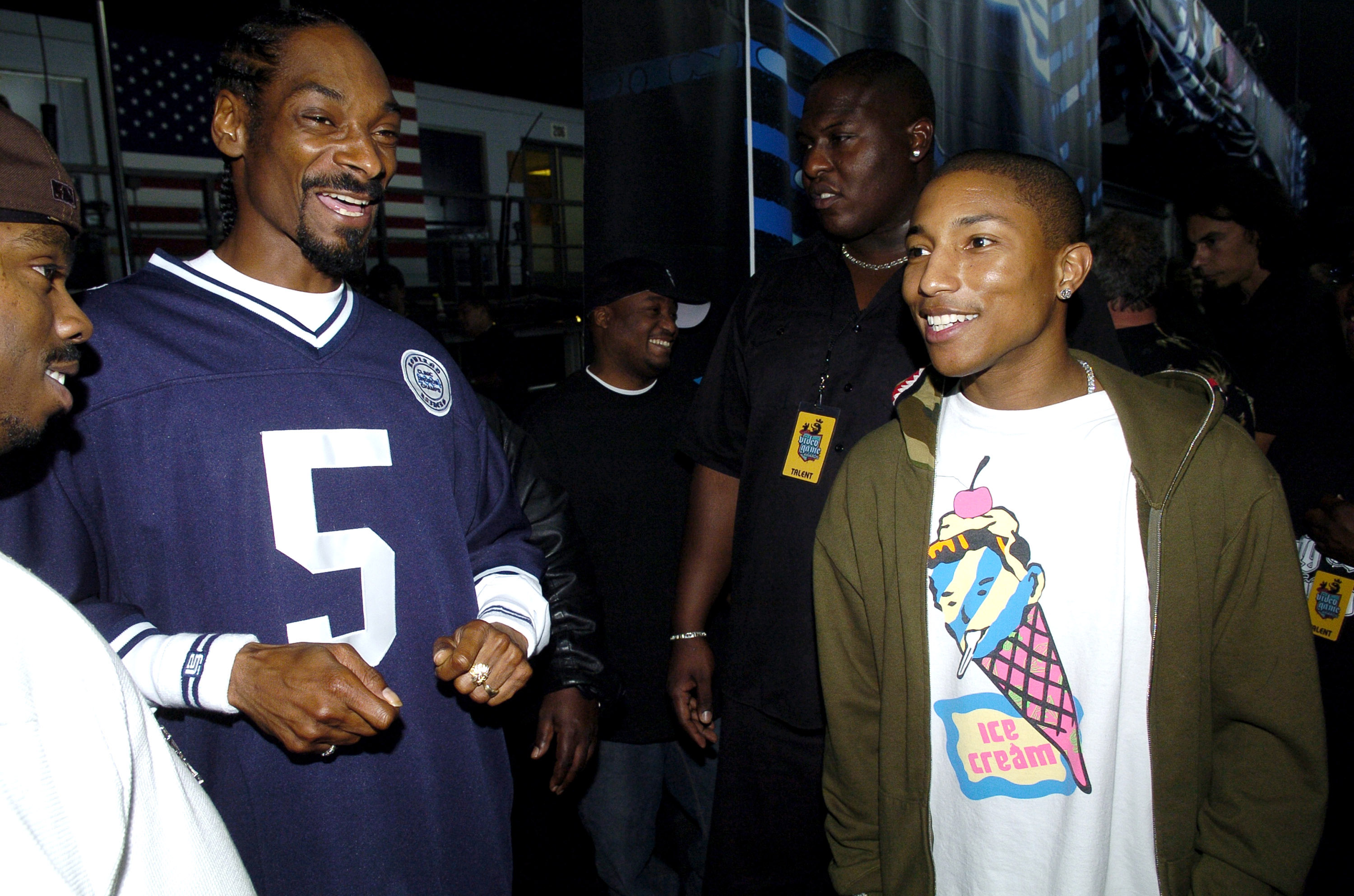 Snoop Dogg and Pharrell Williams during Spike TV's 2nd Annual "Video Game Awards 2004" - Backstage at Barker Hangar in Santa Monica, California, United States.