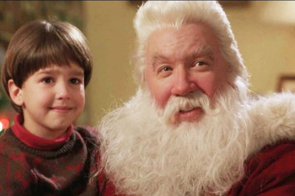 Charlie Calvin (Eric Lloyd) and Scott Calvin (Tim Allen) in The Santa Clause.