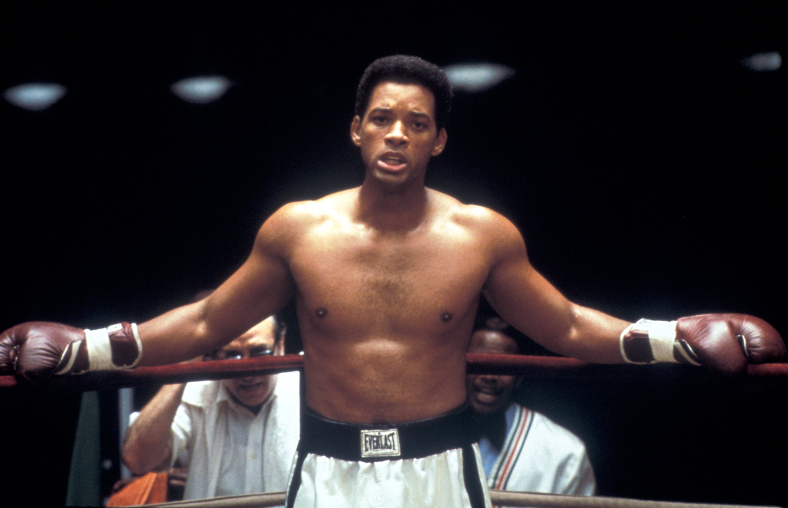 Will Smith in a boxing ring with gloves on during a fight as Muhammad Ali in Ali 