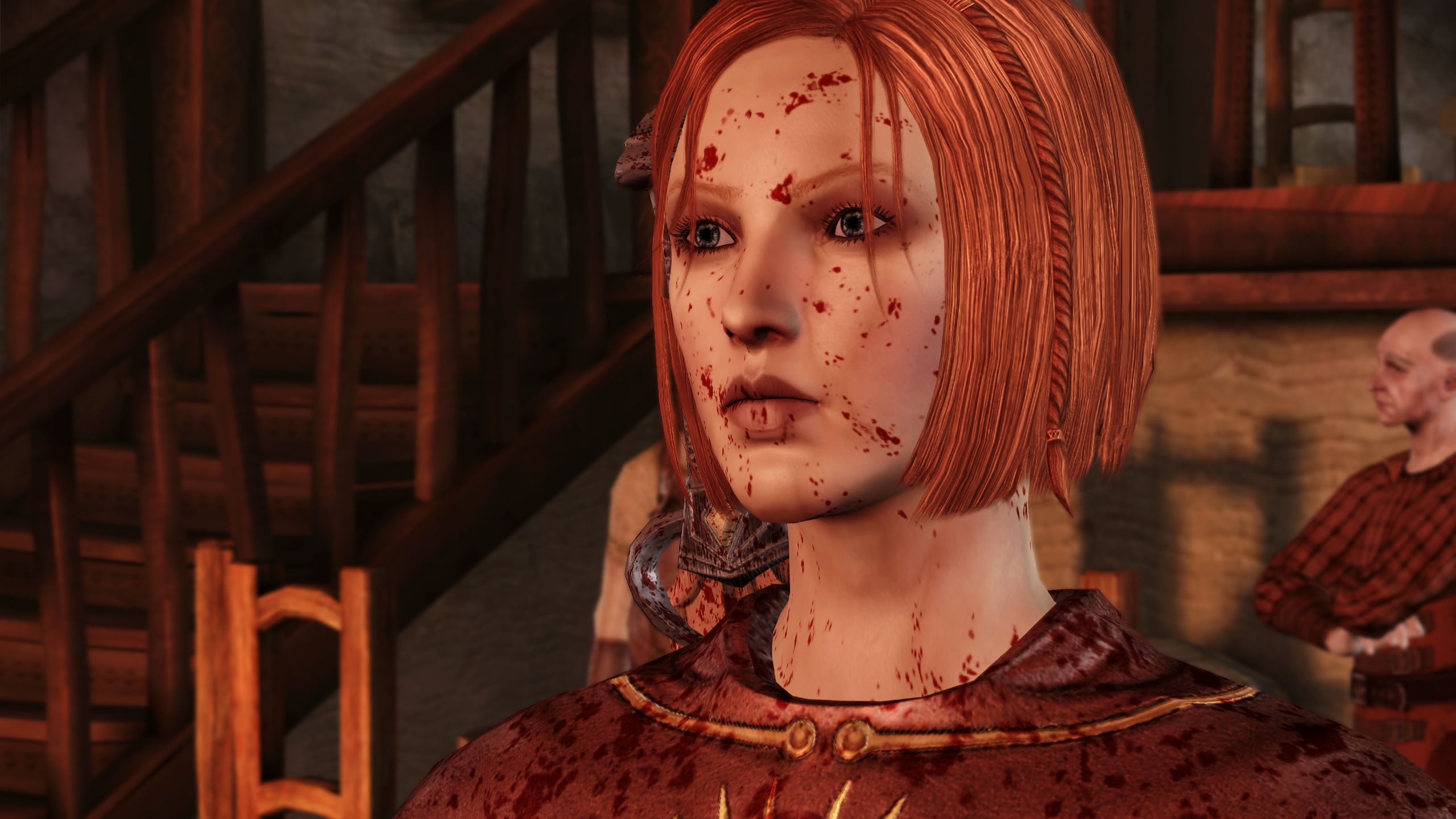 Leliana from Dragon Age: Origins, her face covered in blood