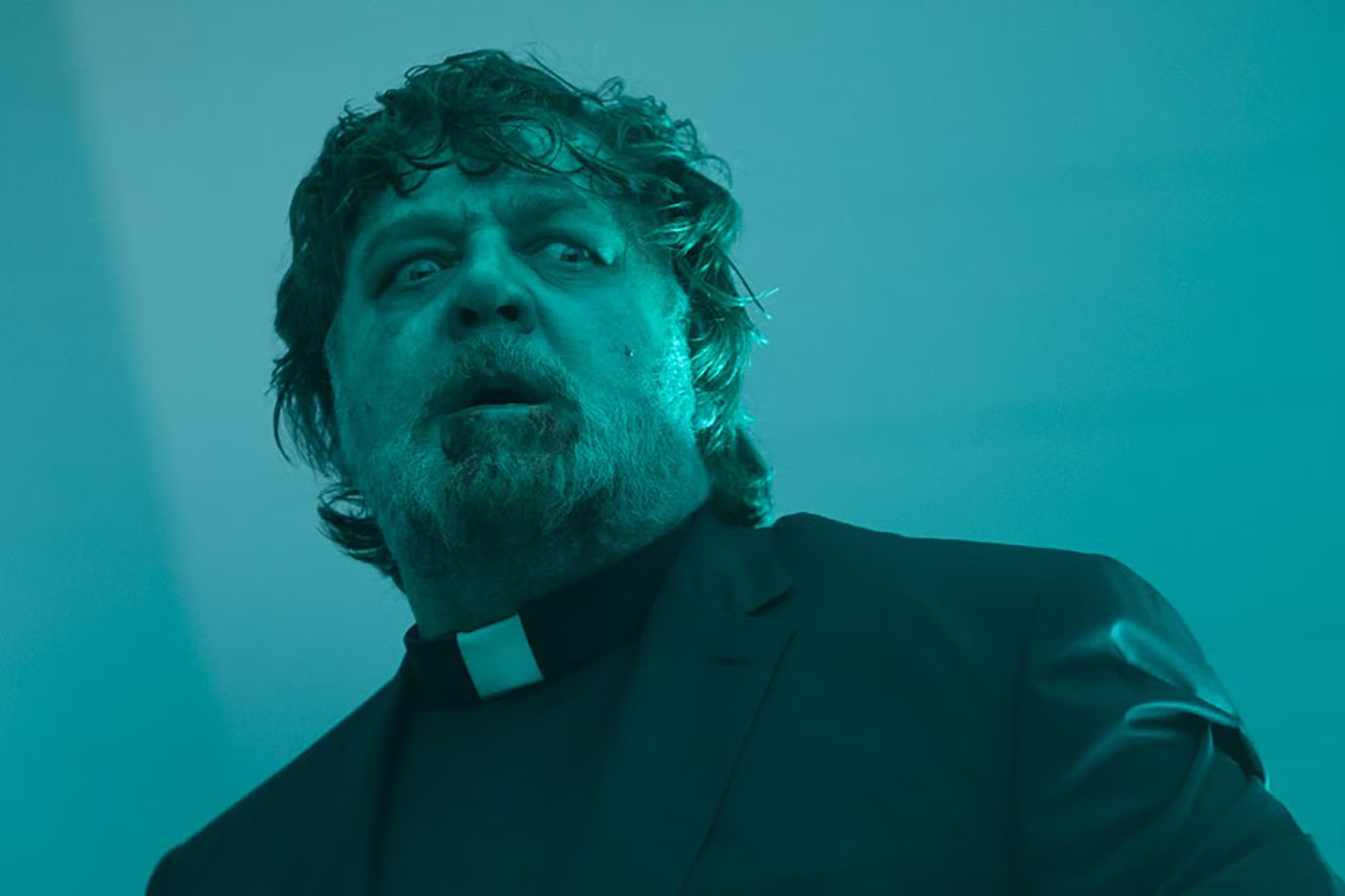 Russell Crowe dressed in a priest’s frock in The Exorcism.