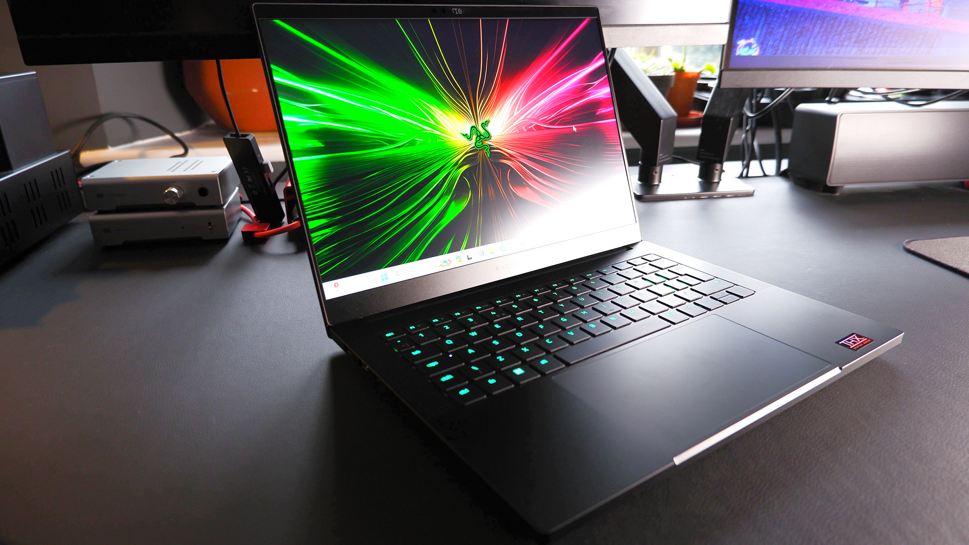 Razer Blade 14 gaming laptop on a desk.