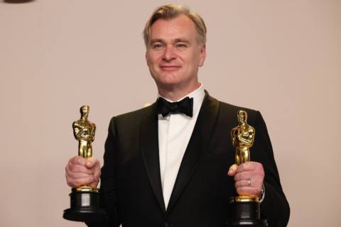 Christopher Nolan holding two Oscars after Oppenheimer wins big at the 96th Academy Awards