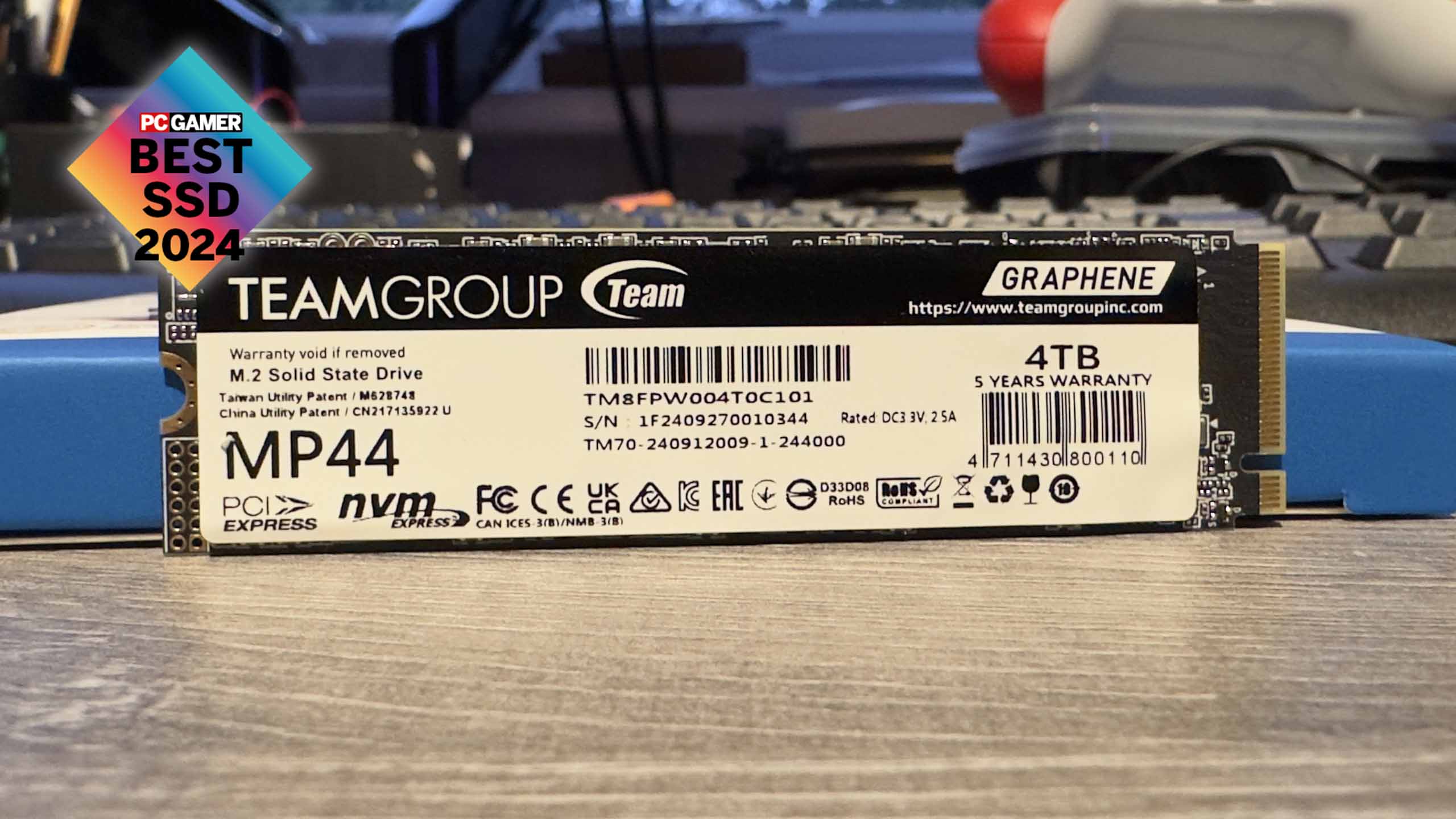 Team Group MP44 4 TB SSD on a desktop